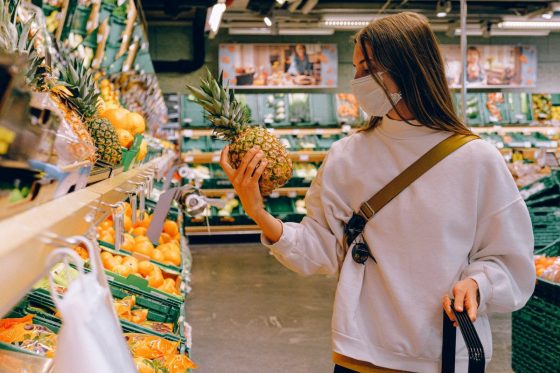 woman wearing mask in supermarket
